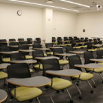 A view of the back of the classroom showing the flexible individual student desks.