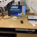 Image of the instructor podium located at the front of the room.