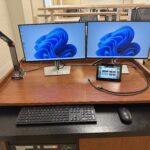 Image of the instructor podium with two monitors.