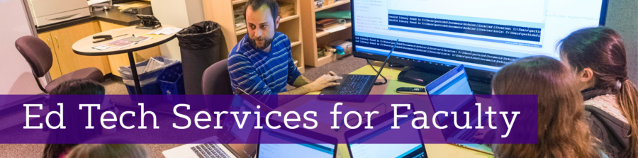 photo of people with laptops sitting around a table in front of a large screen, with one person assisting the others, overlaid with text that says Ed Tech Services for Faculty