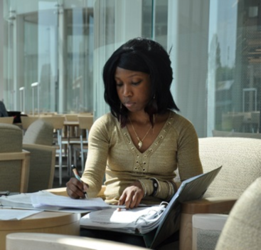 photo of woman writing