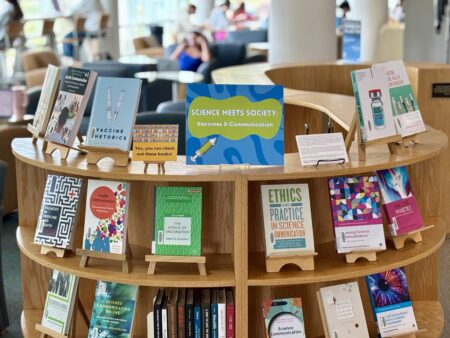 Photo of the "Science Meets Society" book display in Rose Library