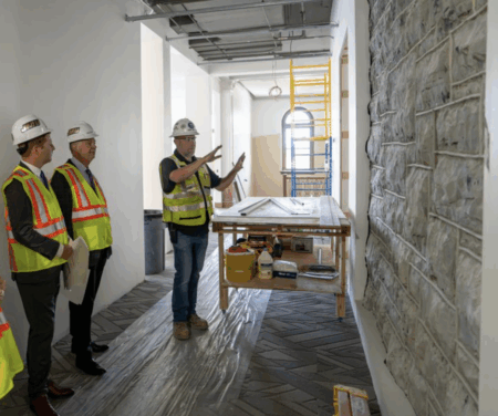 people looking at the bluestone walls