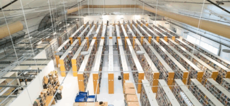 aerial view of dozens of bookcases in a warehouse