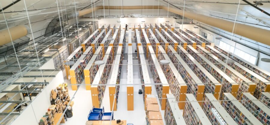 aerial view of dozens of bookcases in a warehouse