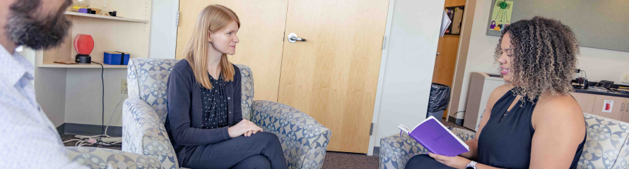photo of 3 faculty members sitting together