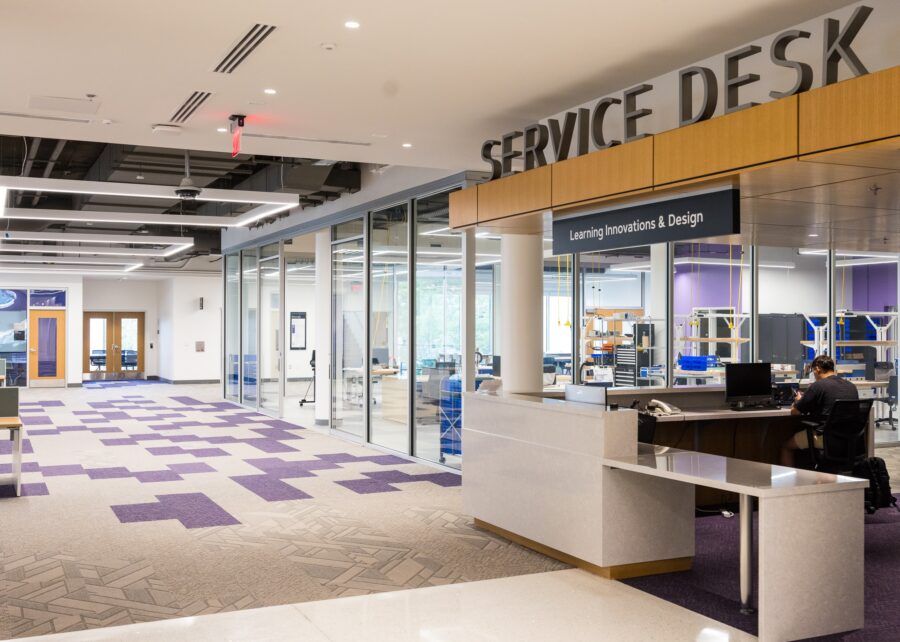 photo of the learning inovations and design desk with the makery visible in the background, in carrier library at jmu