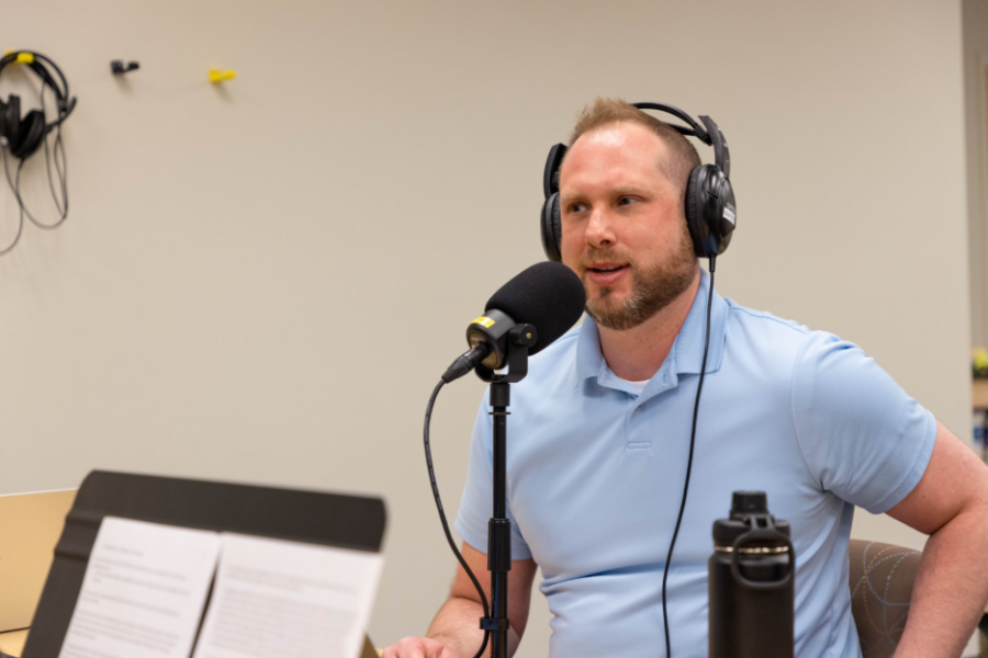 man with microphone and headphones